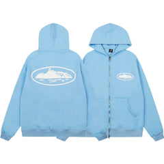 Corteiz Oval Island Logo Full‑Zip Light Blue Hooded Jacket